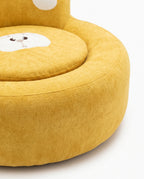 Paw Lounge Chair in Yellow close-up showing round seat and paw-shaped backrest detail