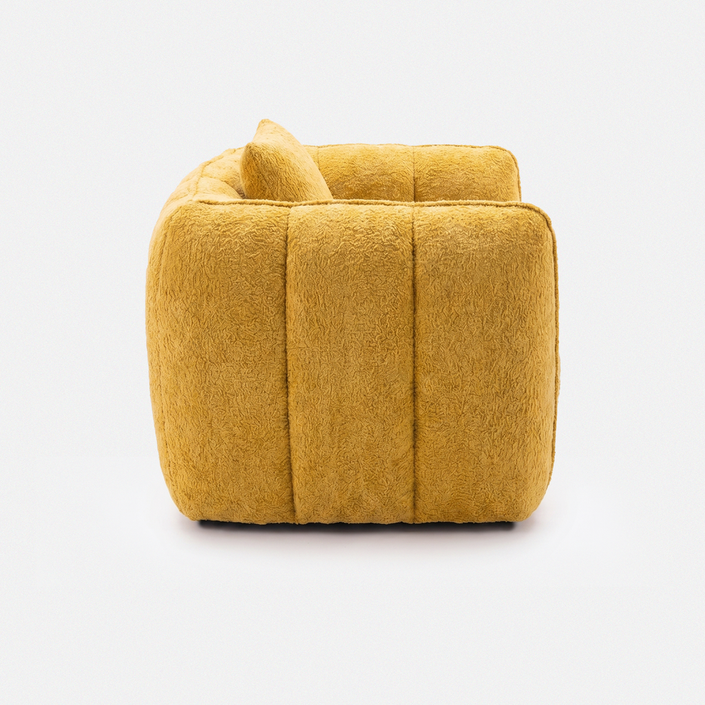 Melo Plush Accent Lounge Chair side view with rounded plush silhouette