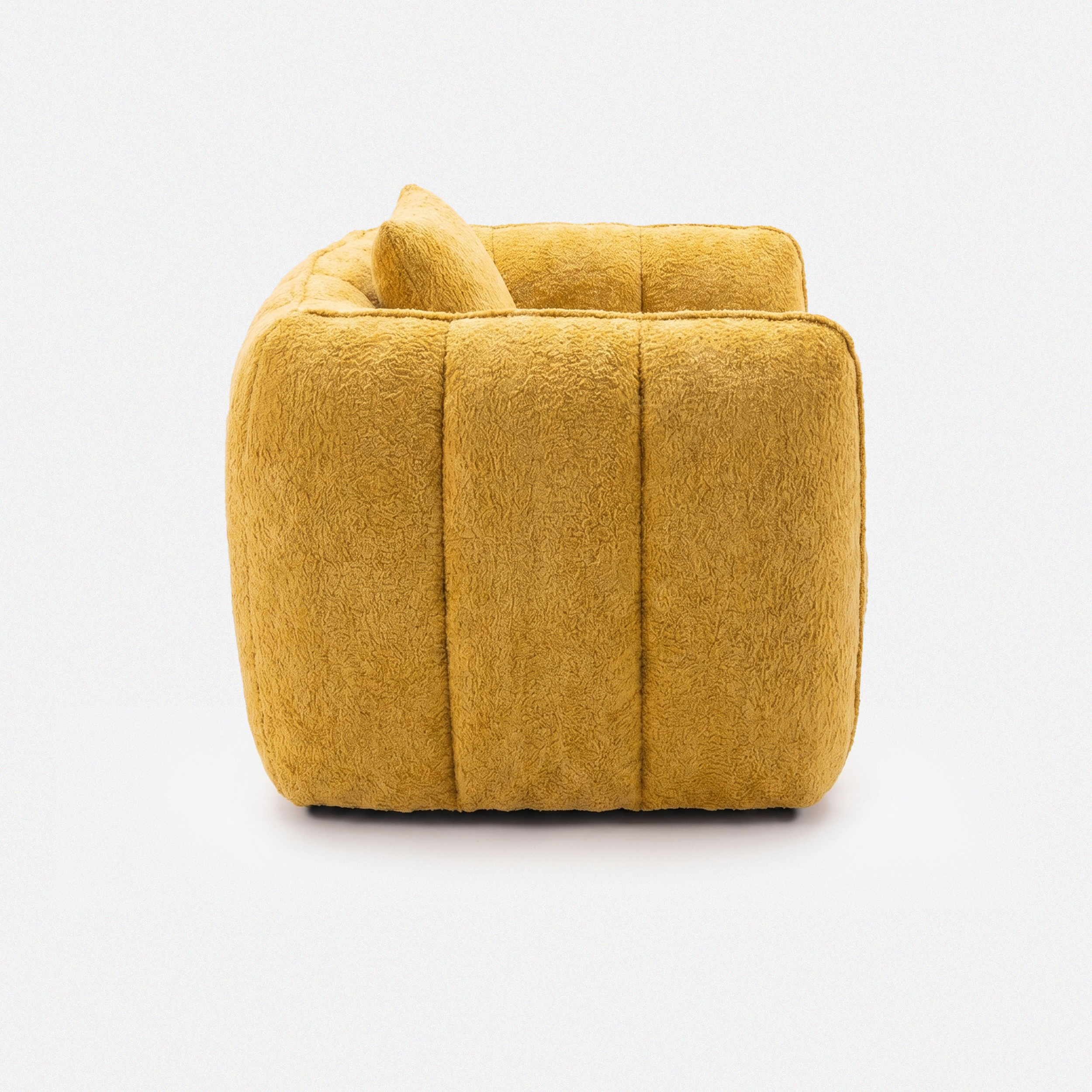 Melo Plush Accent Lounge Chair side view with rounded plush silhouette