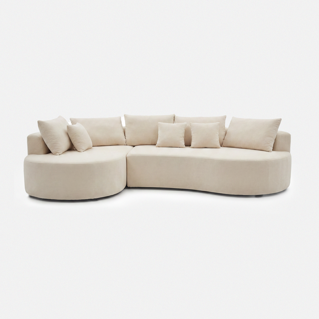 Cove Curved Sleeper Sofa in cream white with rounded arms and soft cushions