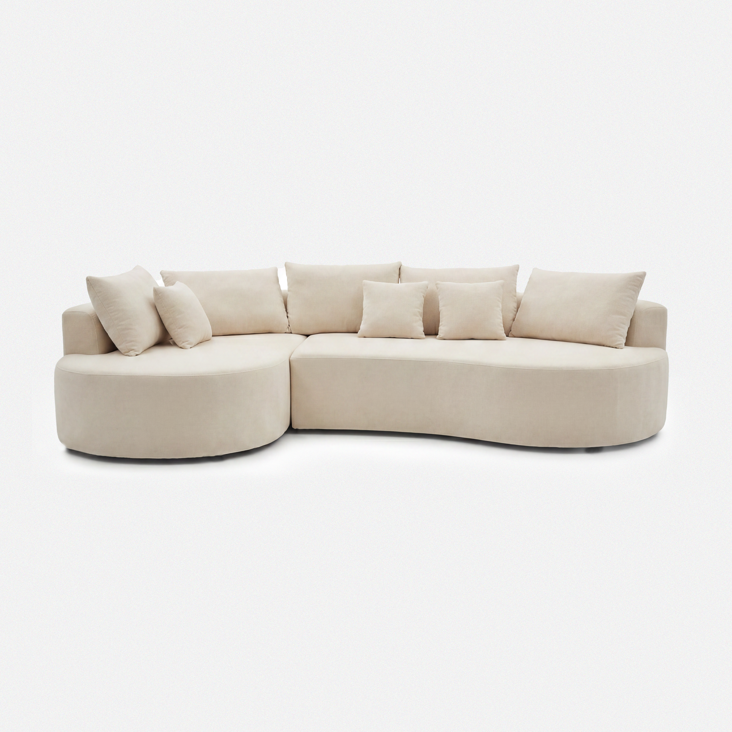 Cove Curved Sleeper Sofa in cream white with rounded arms and soft cushions