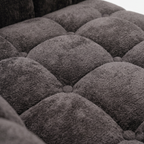 Close-up of charcoal plush corduroy fabric on Melo loveseat