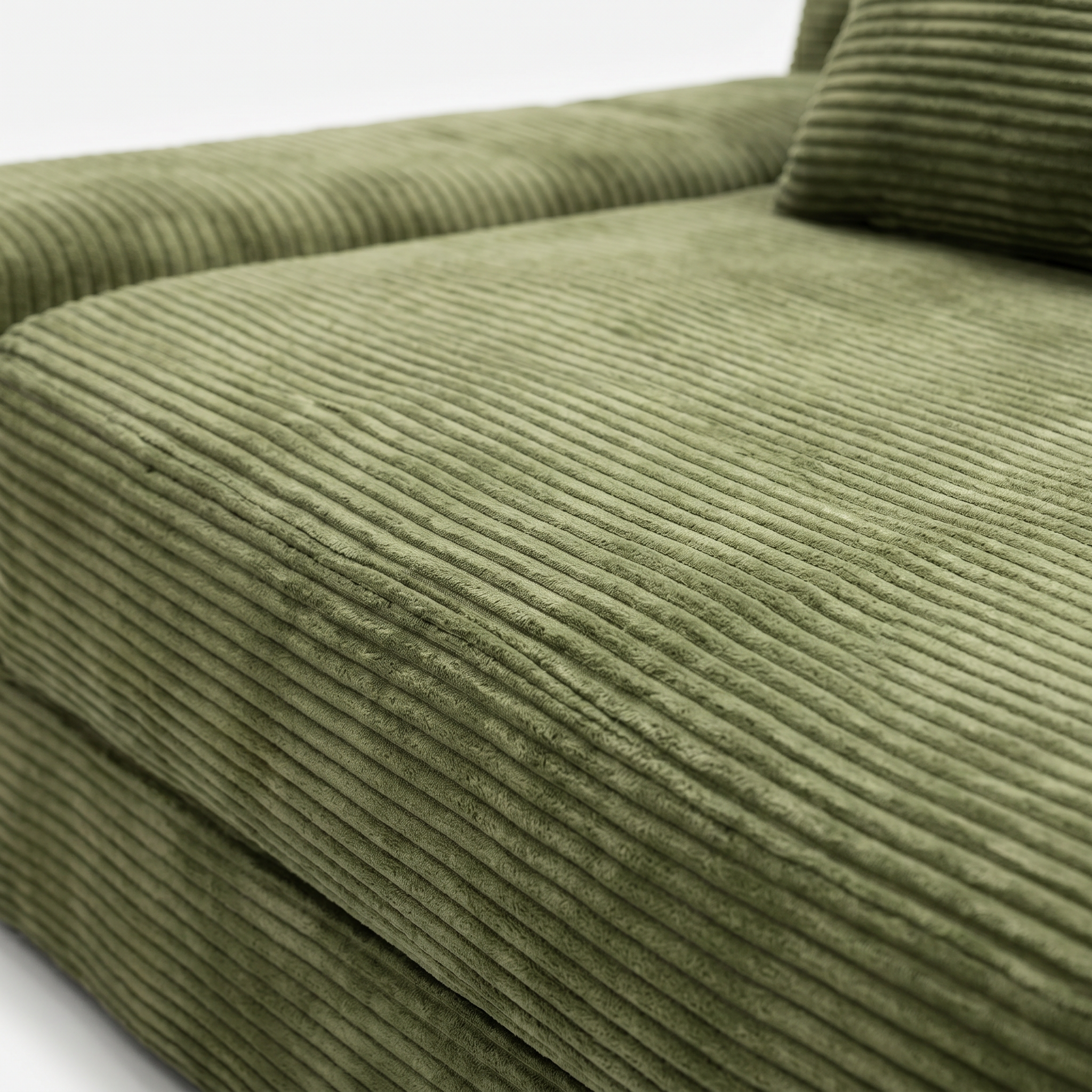 Haven Low-Profile Sleeper Sofa in Moss with plush corduroy seat cushion detail