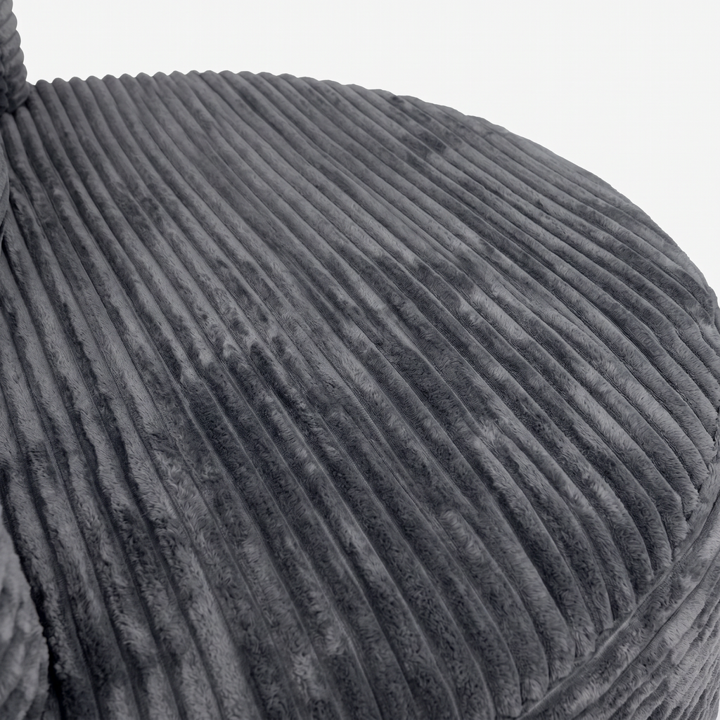 Noma Charcoal Deep Lounge Chair close-up showing curved corduroy seat texture