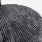 Noma Charcoal Deep Lounge Chair close-up showing curved corduroy seat texture