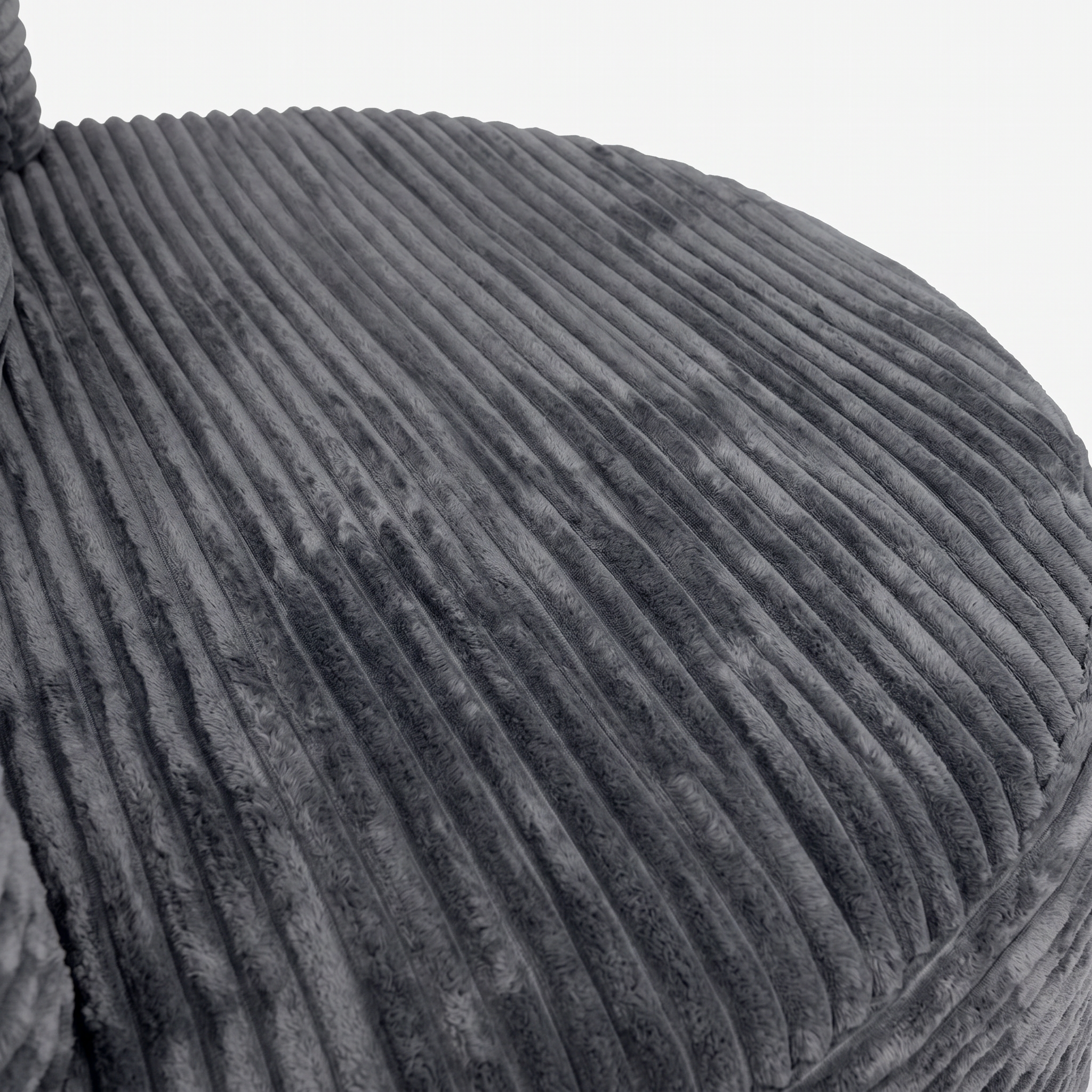 Noma Charcoal Deep Lounge Chair close-up showing curved corduroy seat texture