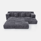 Lune Cloud Sectional Sofa in Charcoal shown as a spacious modular lounge bed
