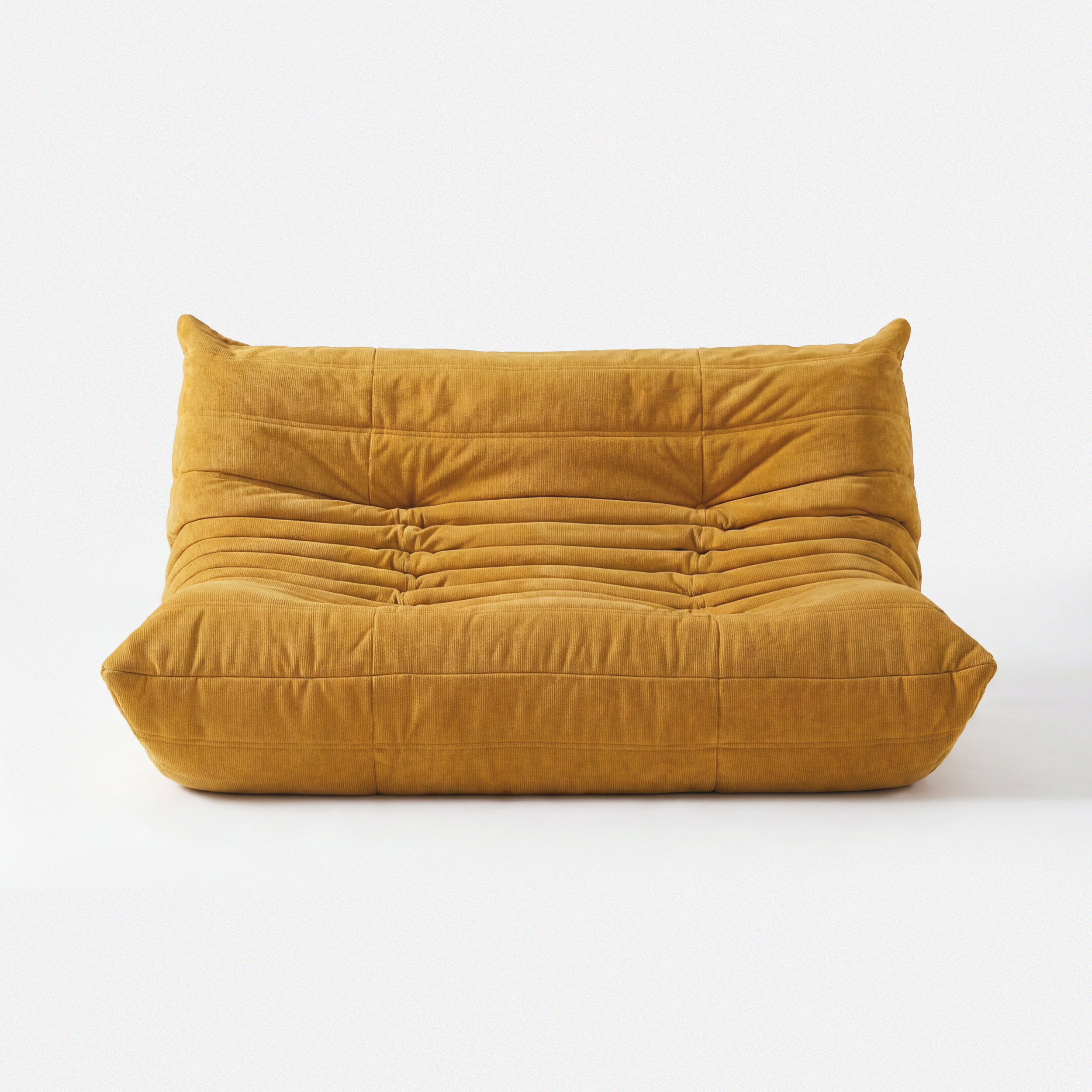 Noma Floor Lounge Chair front view with pleated backrest and soft yellow seat