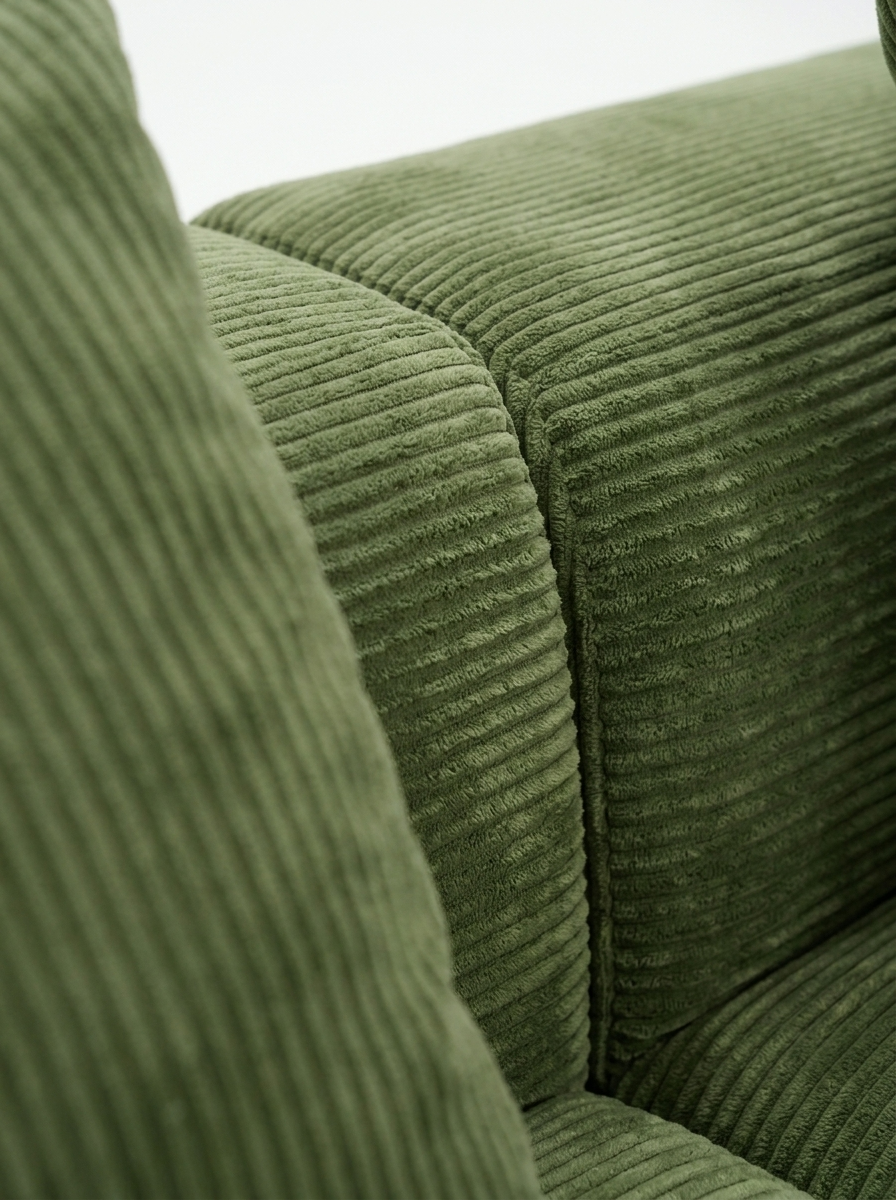 Close-up of emerald plush corduroy fabric on Haven sleeper sectional sofa