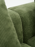 Close-up of emerald plush corduroy fabric on Haven sleeper sectional sofa