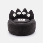 Paw Lounge Chair in Black with playful cat paw design and soft plush seat
