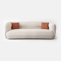 Lune Bouclé Crescent Sofa in cream white with soft curved silhouette