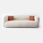 Lune Bouclé Crescent Sofa in cream white with soft curved silhouette