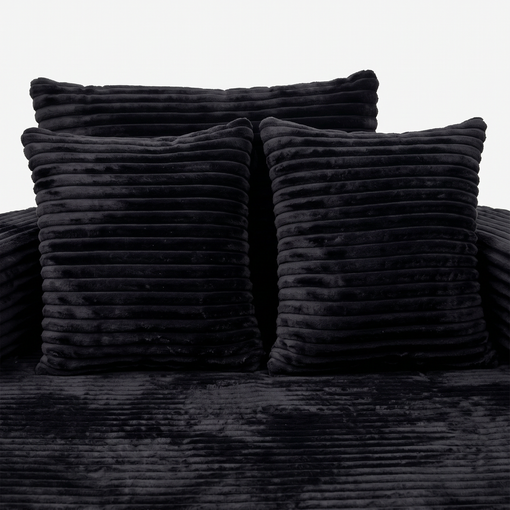 Noma Charcoal Deep Lounge Chair with plush pillows and deep cushioned seat