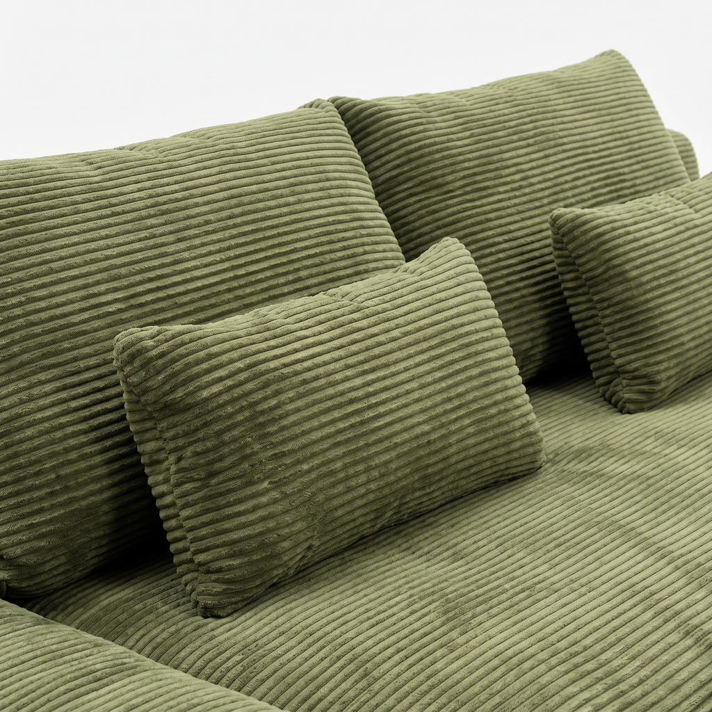 Haven Low-Profile Sleeper Sofa in Moss with plush corduroy pillows and seat detail