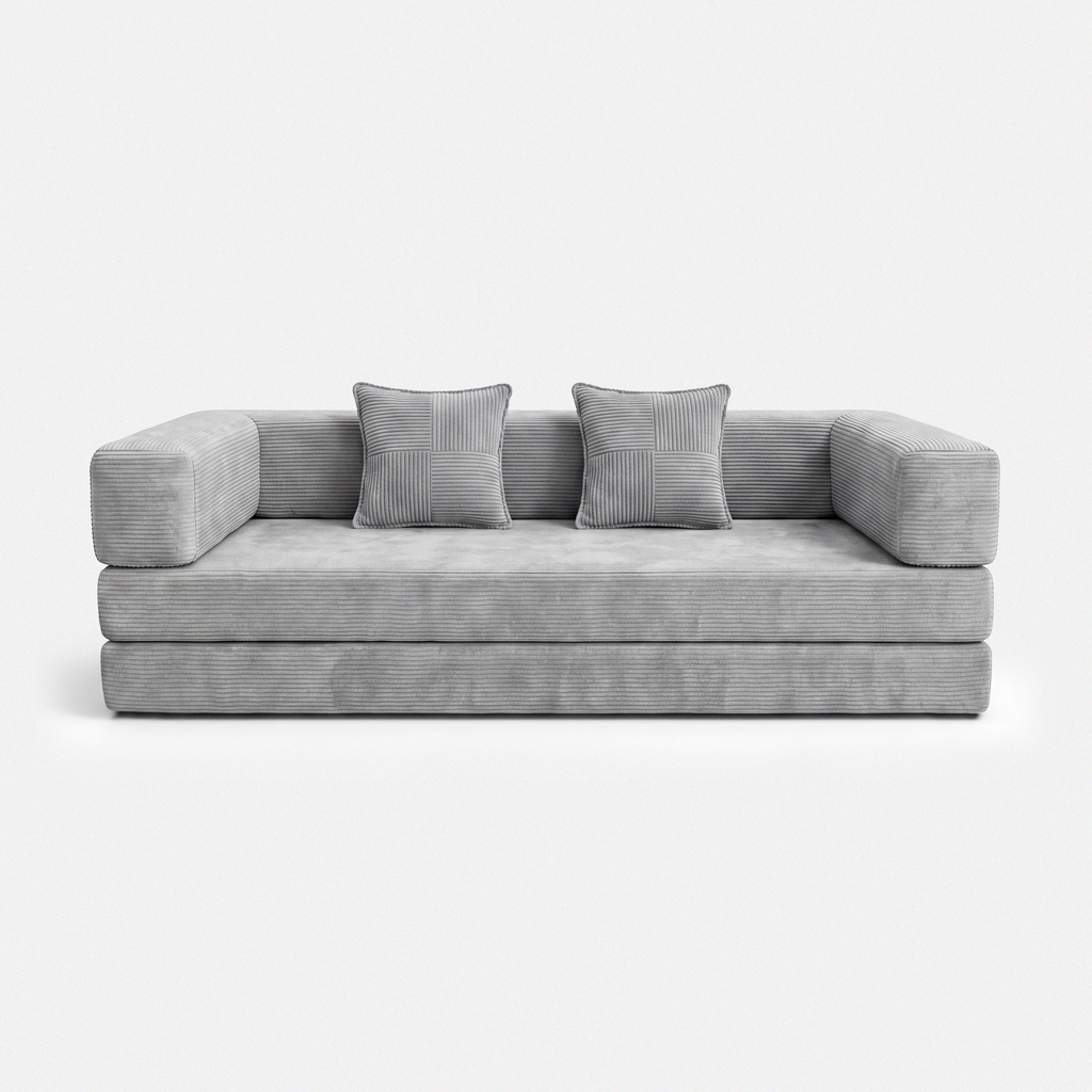Milo Corduroy Sleeper Sofa in Light Grey with pillows and low-profile sofa bed design