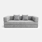 Milo Corduroy Sleeper Sofa in Light Grey with pillows and low-profile sofa bed design