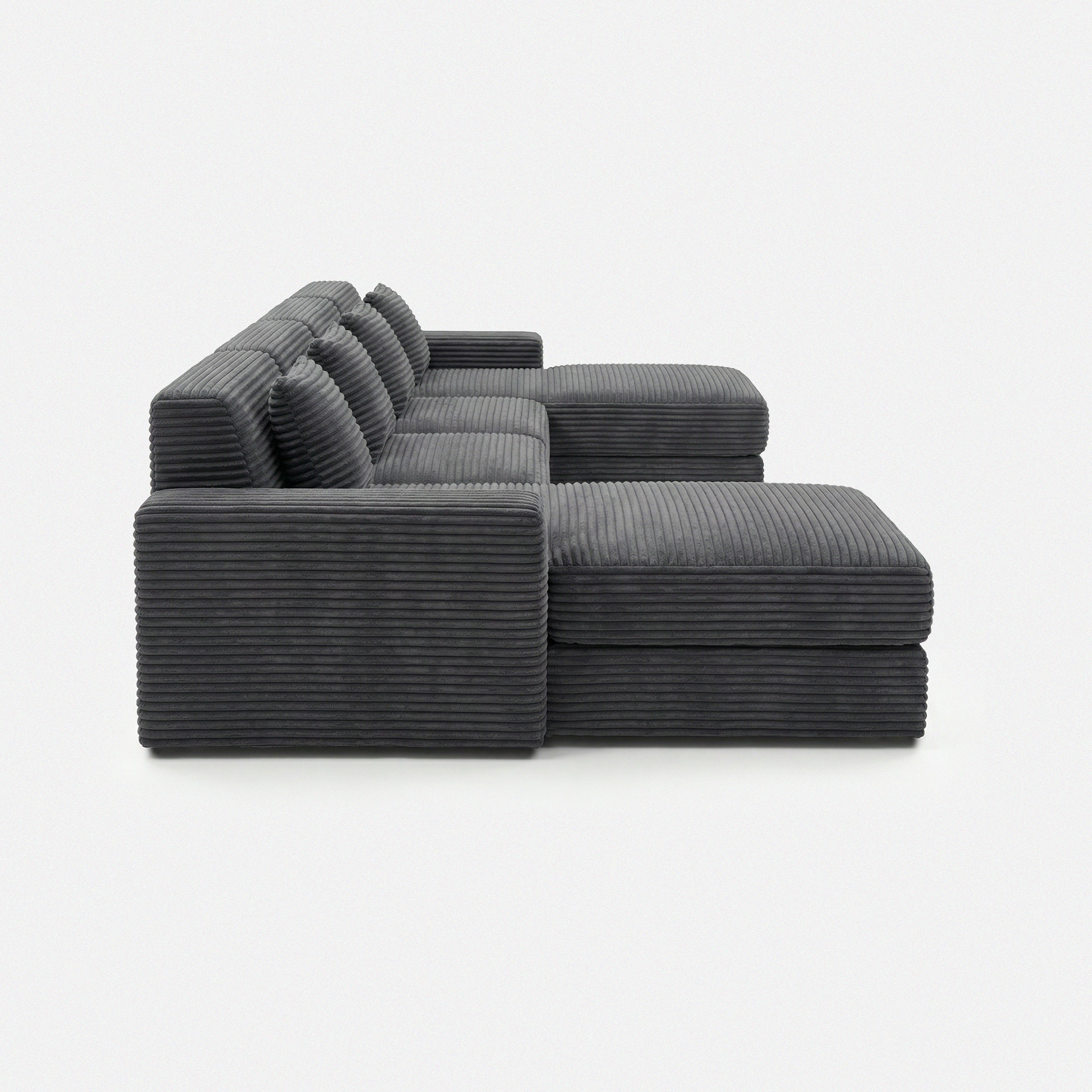 Noma Modular Lounge Set in Charcoal side view with deep chaise and modular structure