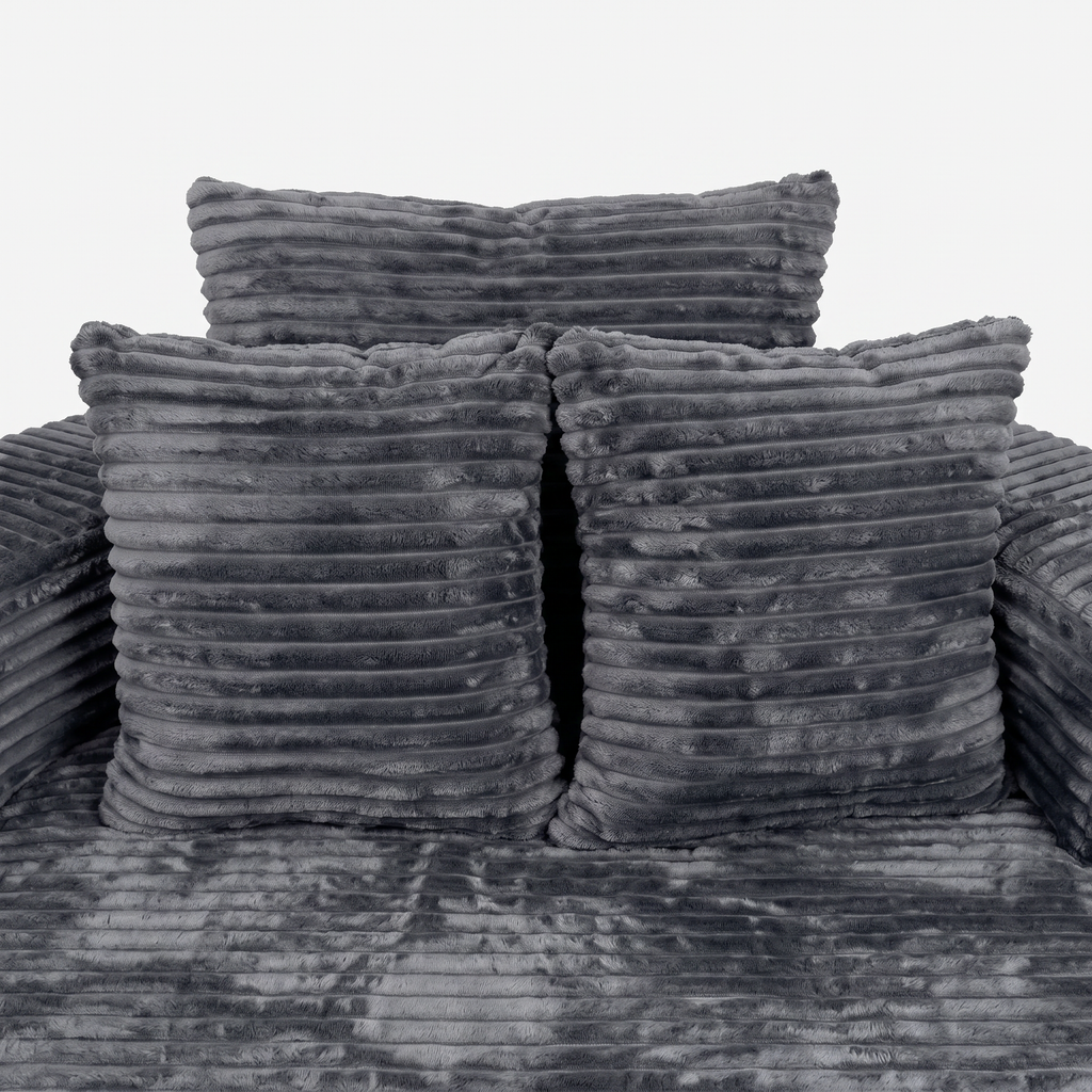 Noma Charcoal Deep Lounge Chair front detail with layered pillows and soft corduroy seat
