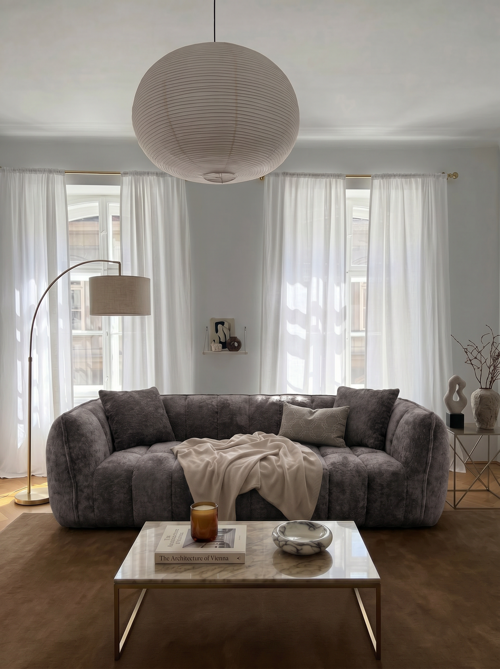 Melo Charcoal Plush Loveseat styled in a modern living room