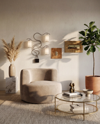 Sola Round Lounge Chair in Light Grey styled in a warm modern living room