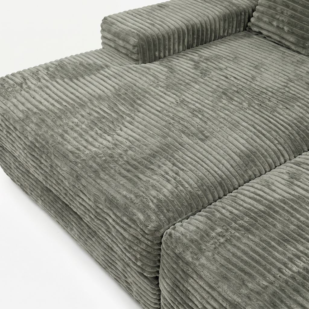 Close-up of matcha plush corduroy fabric on Lune Horizon sectional sofa