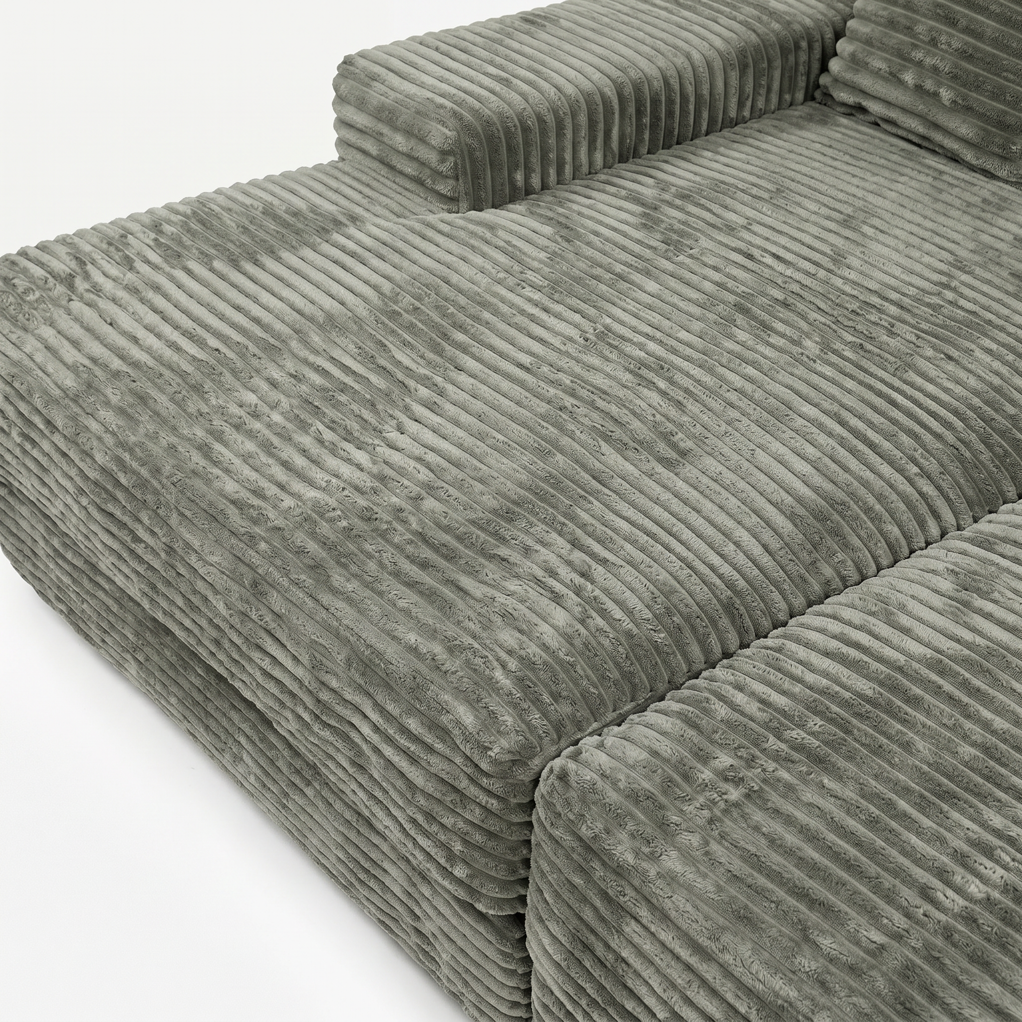 Close-up of matcha plush corduroy fabric on Lune Horizon sectional sofa