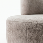 Sola Round Lounge Chair seat edge detail with soft light grey upholstery