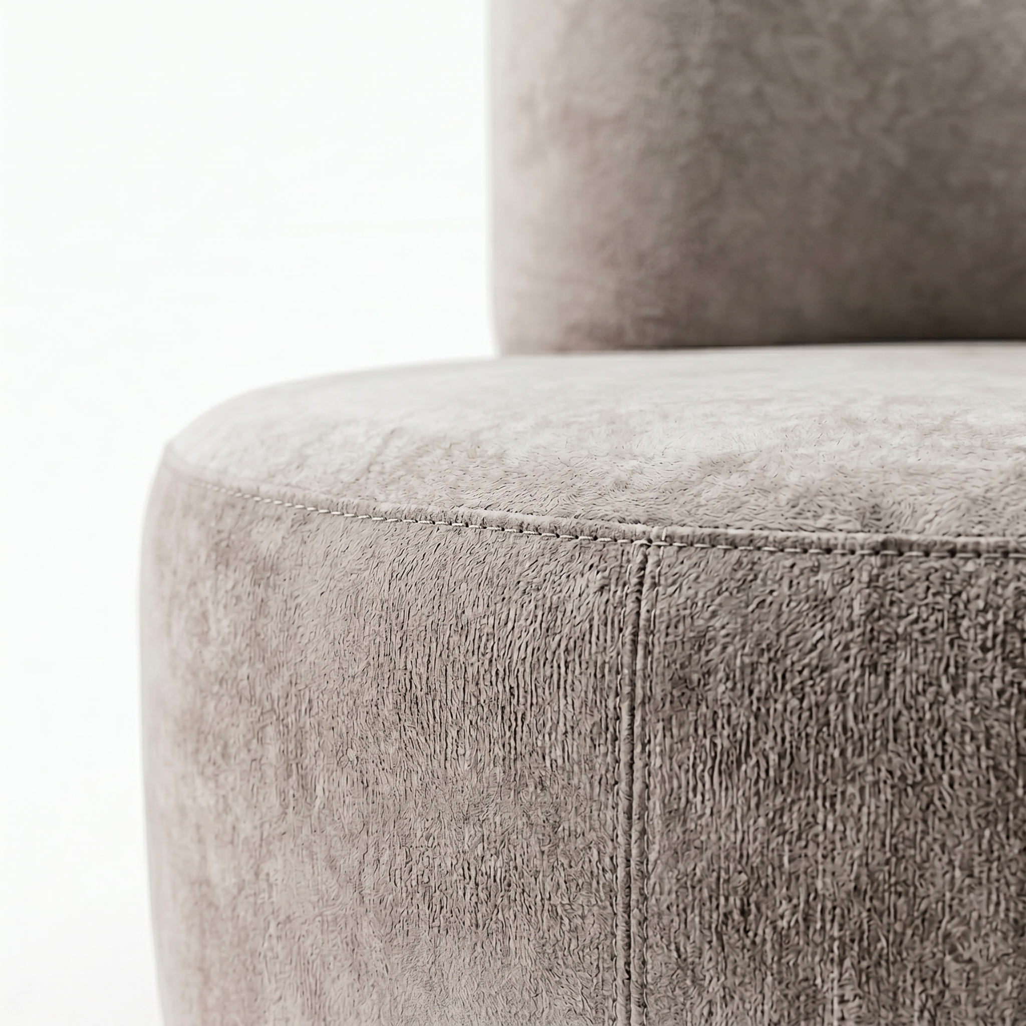 Sola Round Lounge Chair seat edge detail with soft light grey upholstery