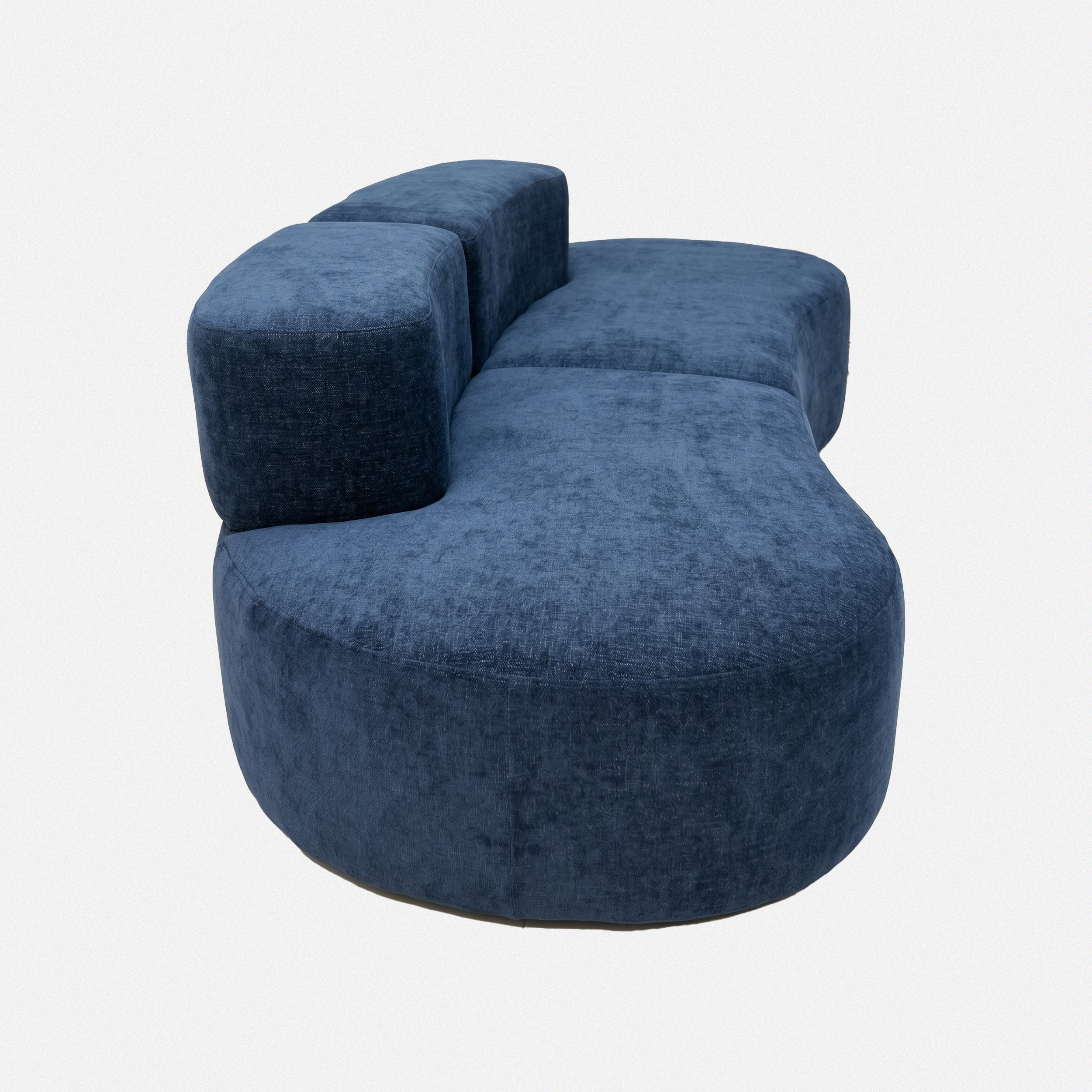 Side view of Casia Navy Wave Lounge Sofa with curved back and deep seat