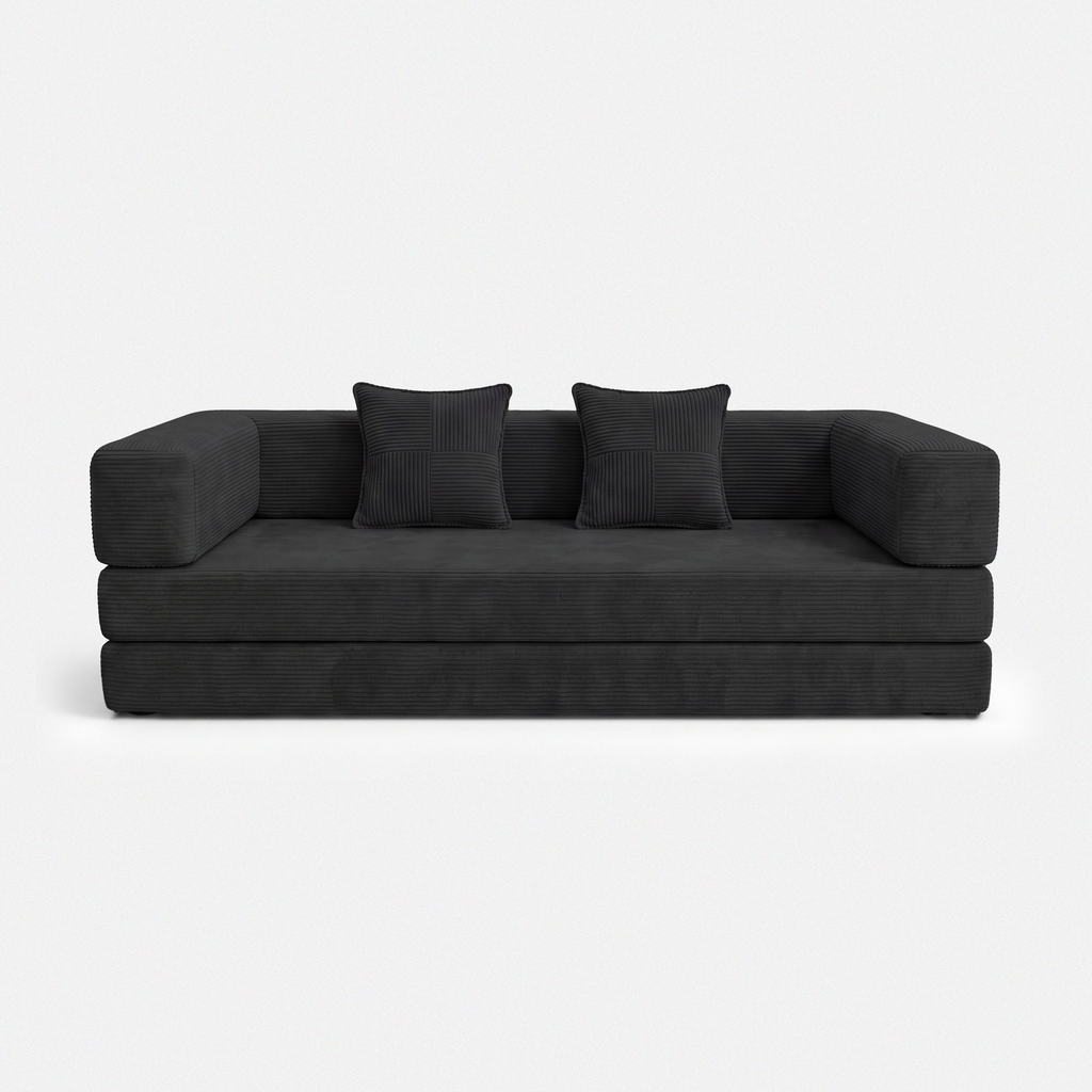Milo Corduroy Sleeper Sofa in Black with pillows and low-profile sofa bed design