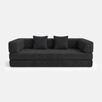 Milo Corduroy Sleeper Sofa in Black with pillows and low-profile sofa bed design