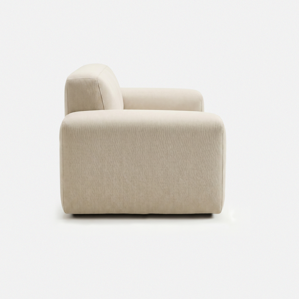 Tovo Cream Wide Accent Chair side view with rounded wide-arm design