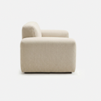 Tovo Cream Wide Accent Chair side view with rounded wide-arm design