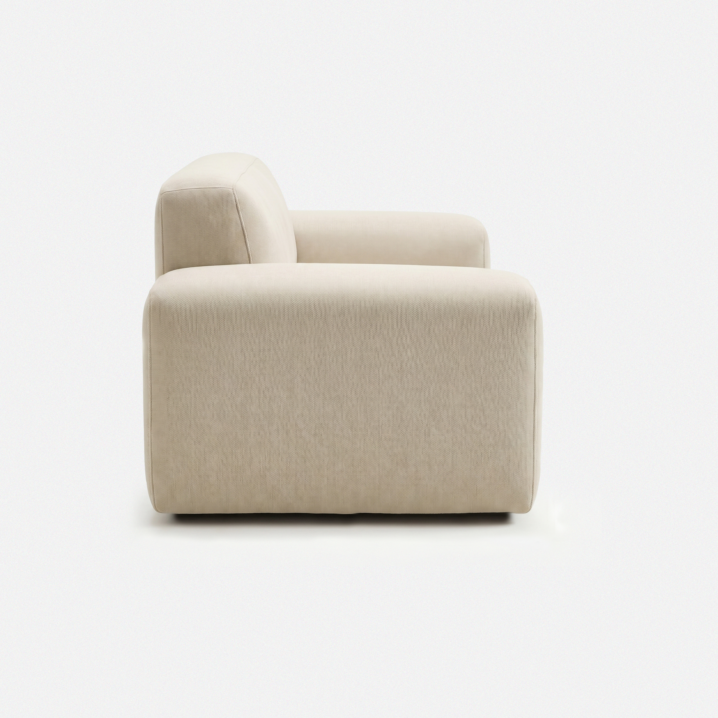 Tovo Cream Wide Accent Chair side view with rounded wide-arm design