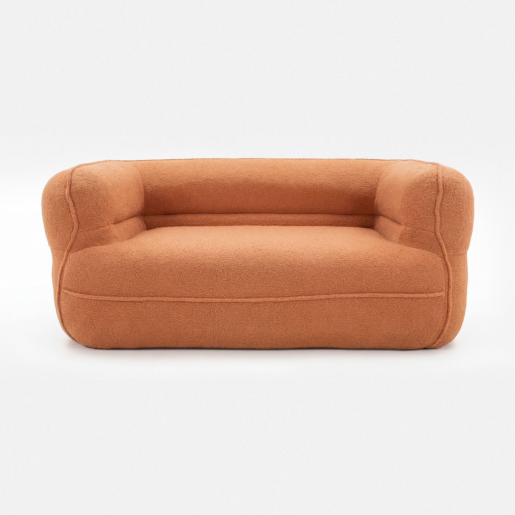 Noma Curved Lounge Loveseat in Tangerine with rounded arms and soft lounge design