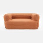 Noma Curved Lounge Loveseat in Tangerine with rounded arms and soft lounge design