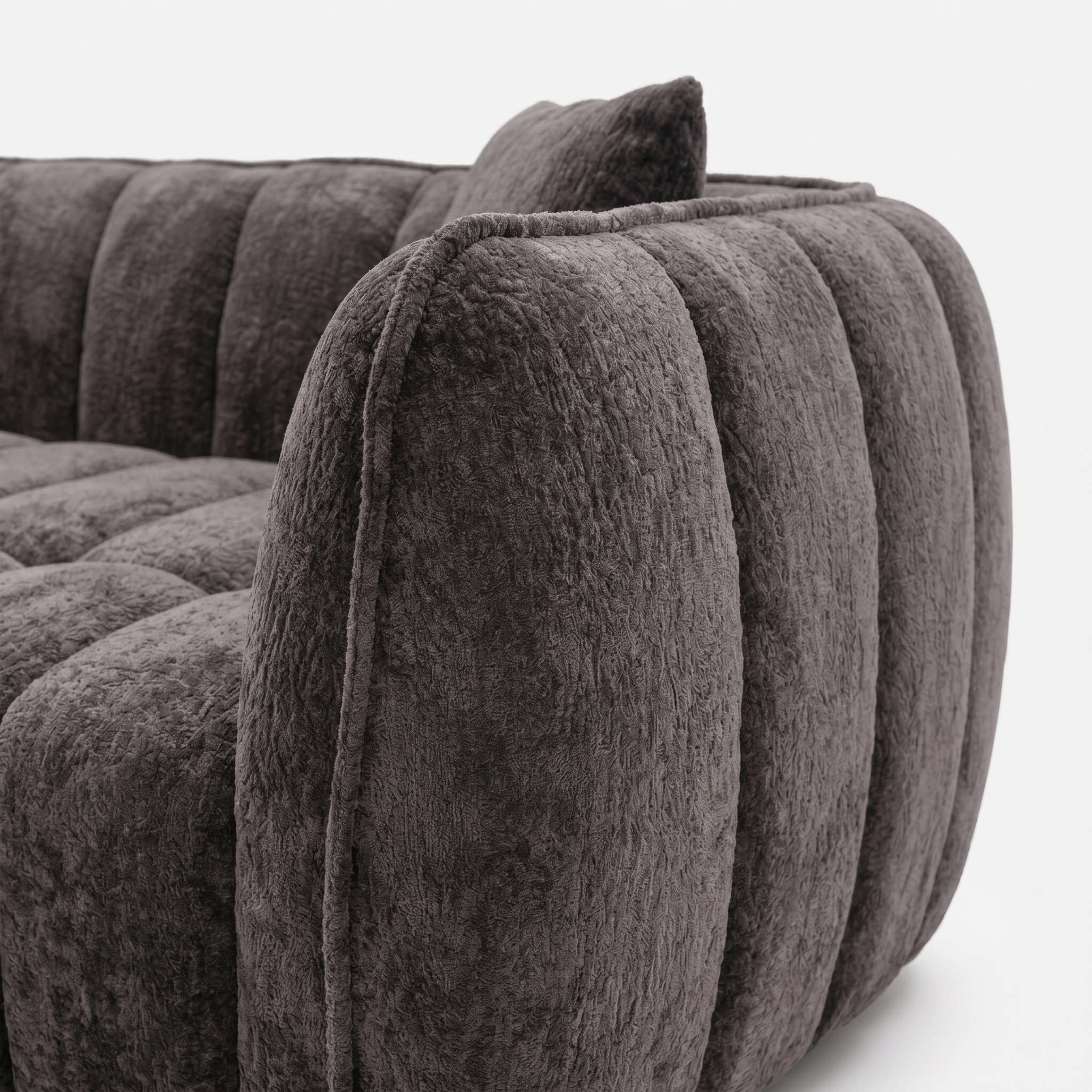 Melo Charcoal Plush Loveseat cushion detail with soft channel-tufted texture