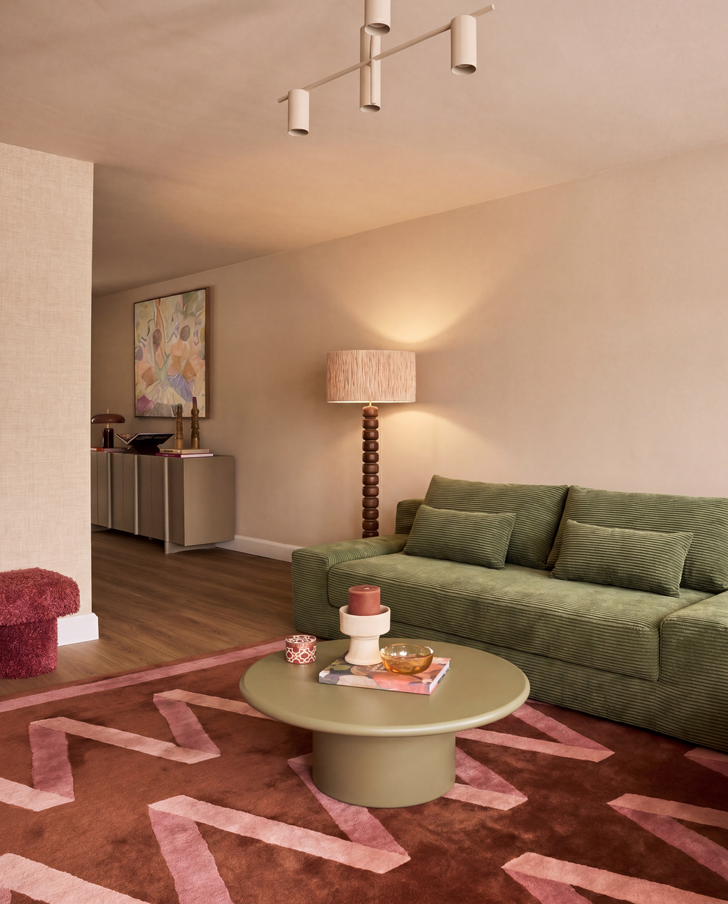 Haven Low-Profile Sleeper Sofa in Moss styled in a warm modern living room