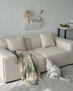 Kivo Modular Block Sectional Sofa styled in a clean modern living room