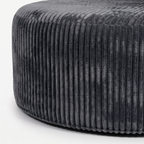 Noma Charcoal Deep Lounge Chair rounded base detail with plush ribbed corduroy upholstery