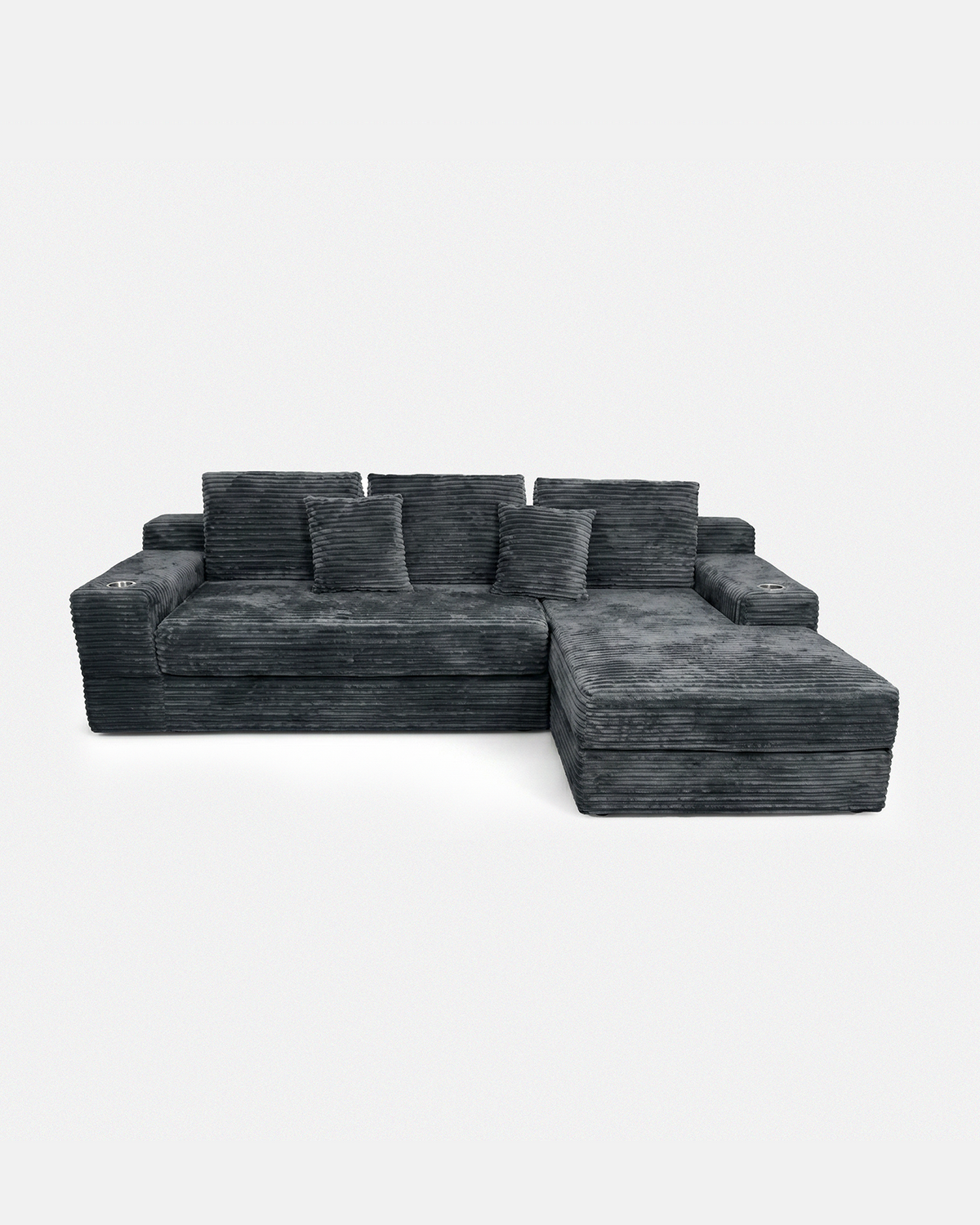 Charcoal modular sectional sofa with chaise and coordinating pillows on a white background