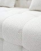 Close-up of Marshmallow Cloud sofa with soft plush grid-tufted seat cushions