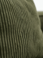 Forest green corduroy fabric detail on Aero modular sectional sofa