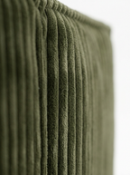 Aero modular sectional sofa armrest detail with plush forest green corduroy texture