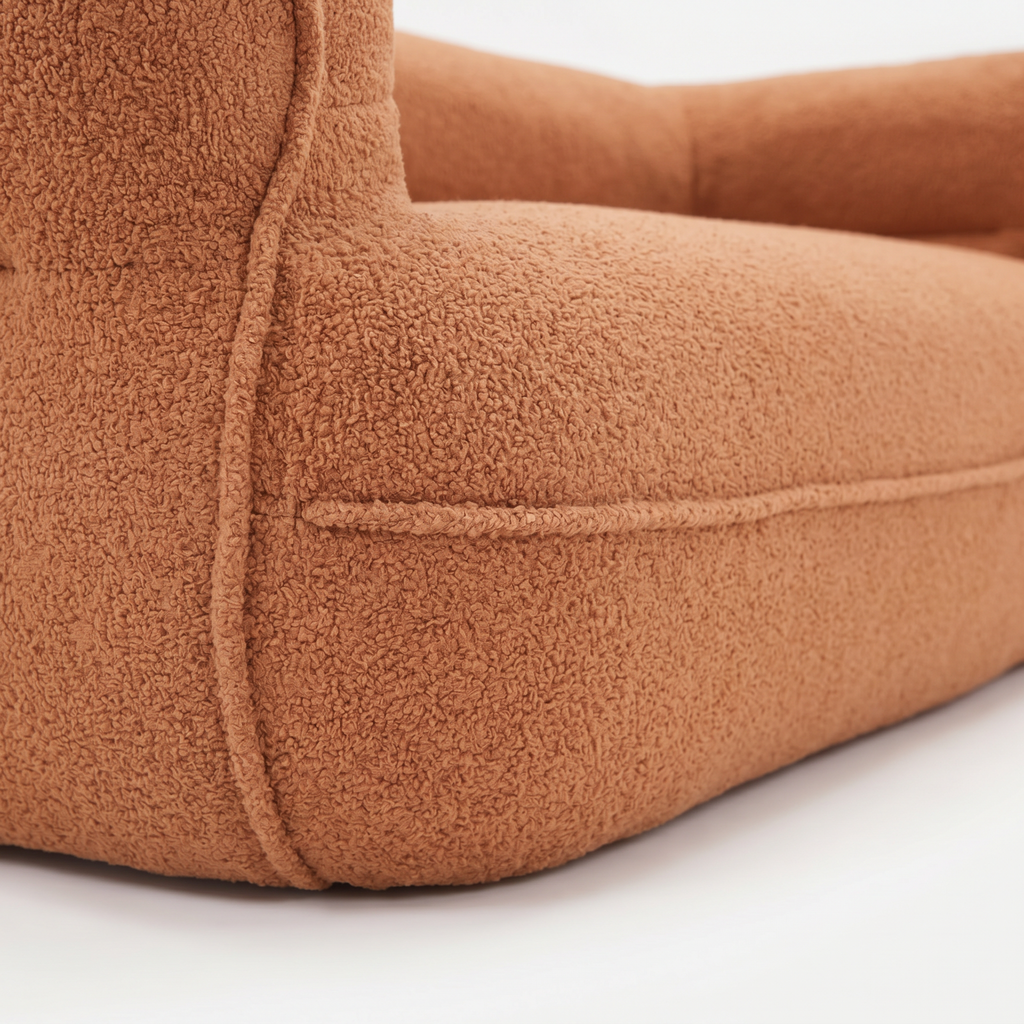 Noma Curved Lounge Loveseat in Tangerine with rounded armrest and textured fabric detail