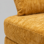 Nido Lounge Bed Sofa side detail with layered cushion structure and soft chenille upholstery