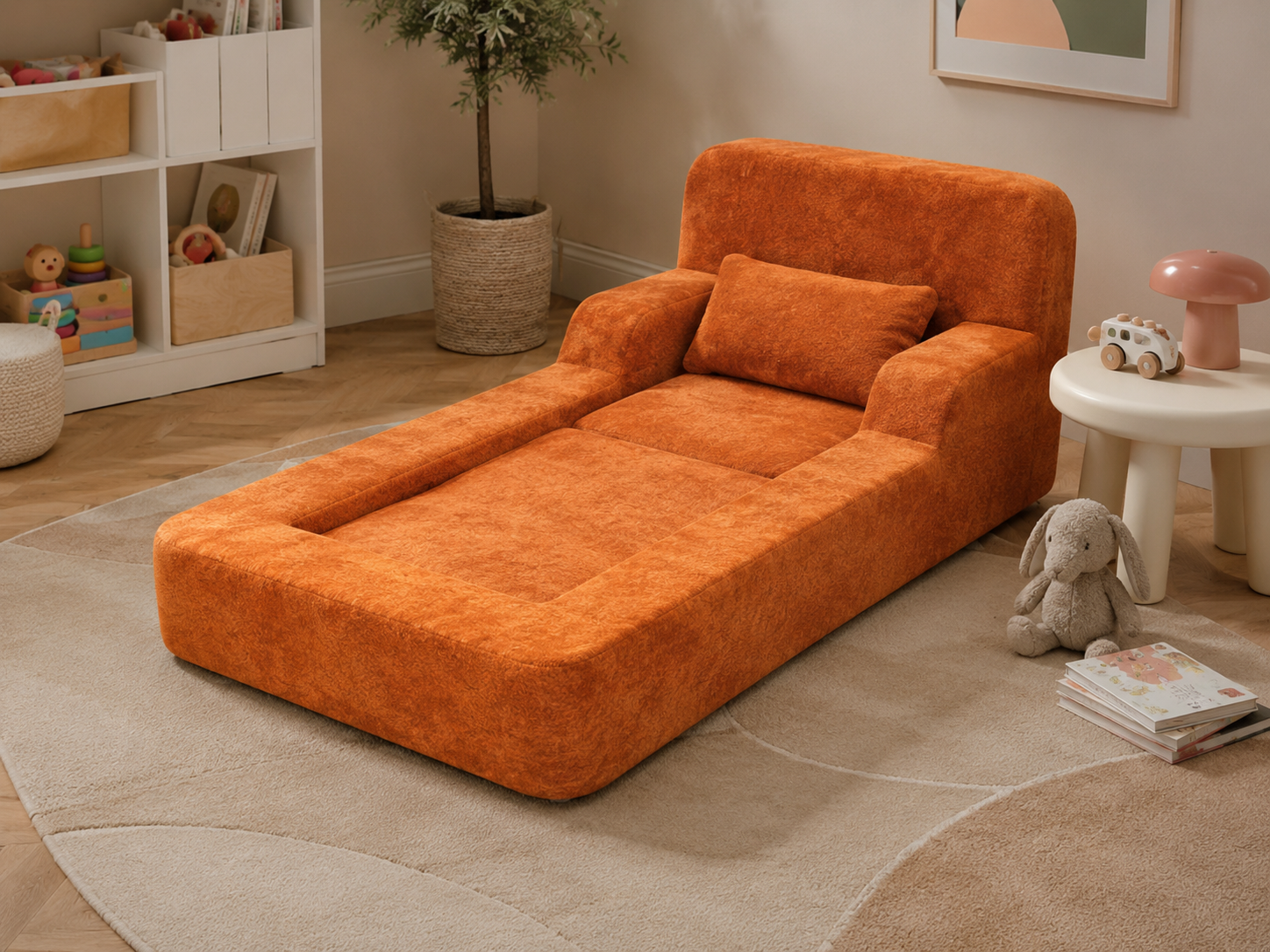 Mimi Kids Accent Lounge Chair in Tangerine styled as a soft kids lounge bed in a cozy playroom