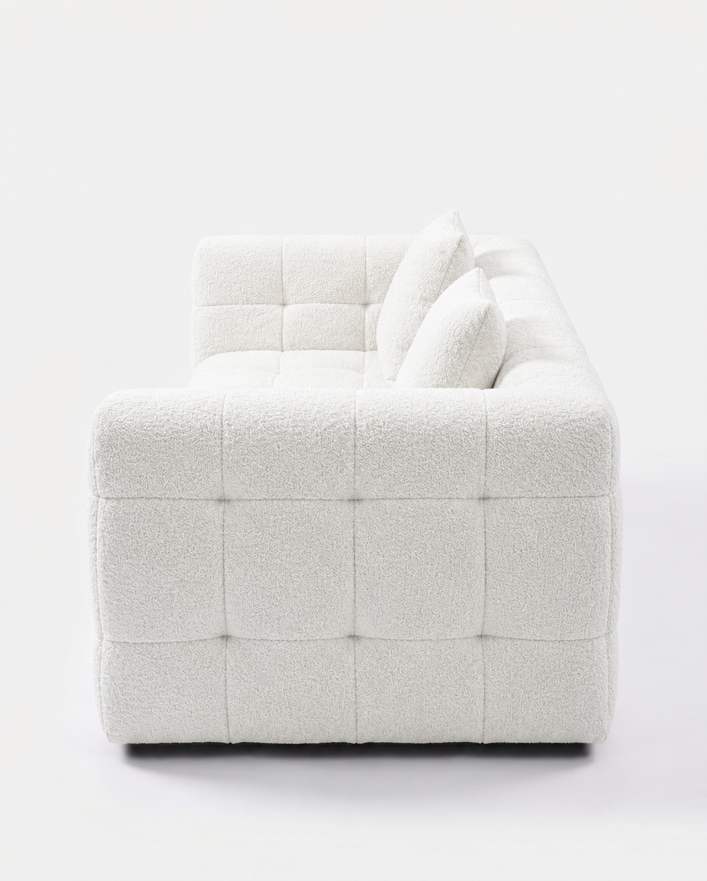 Marshmallow Cloud Lounge Sofa side view with white grid-tufted upholstery