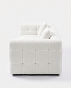 Marshmallow Cloud Lounge Sofa side view with white grid-tufted upholstery